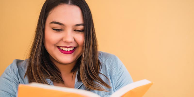 Woman Looking at Course Guide